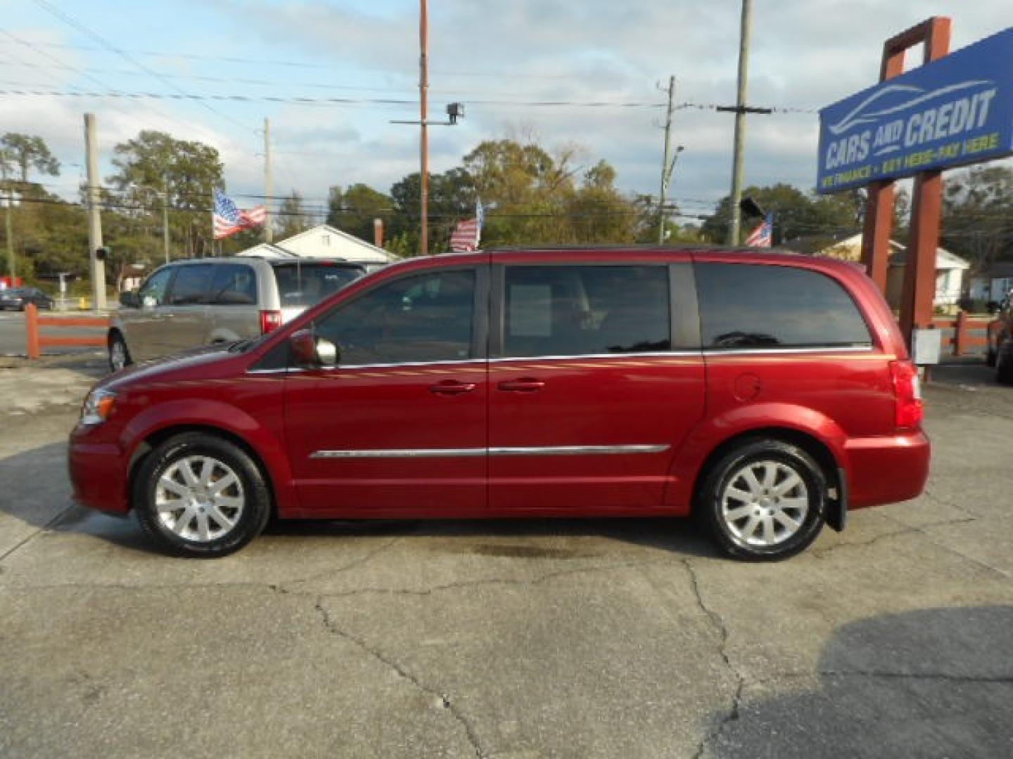 2013 BURGUNDY CHRYSLER TOWN and COUNTRY TOURI (2C4RC1BG9DR) , located at 1200 Cassat Avenue, Jacksonville, FL, 32205, (904) 695-1885, 30.302404, -81.731033 - Photo#1